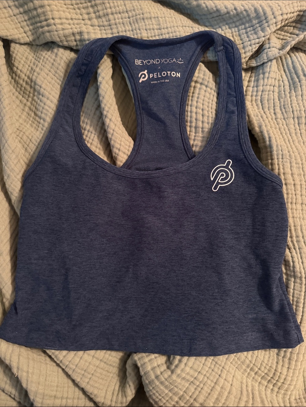 Peloton x Beyond Yoga Women's Navy Racerback sports bra